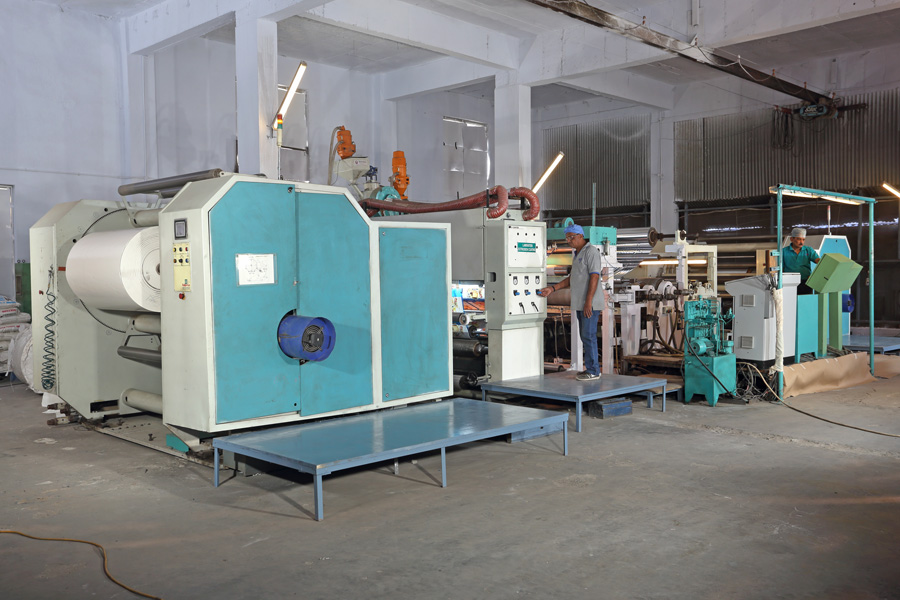 PLC Based Fully Automatic Extrusion Coating Machine of 1500 MM Width with auto turret winder & un-winder